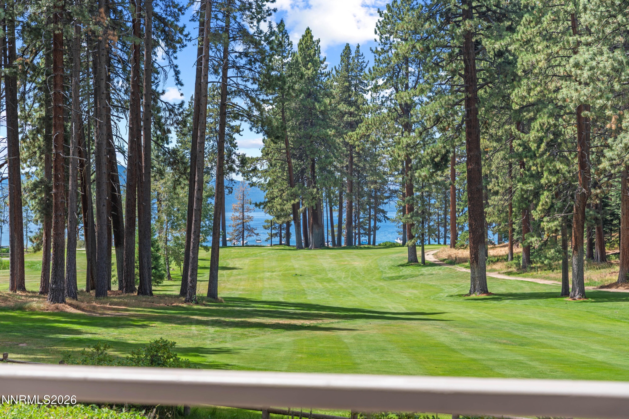 View across the Glenbrook fairway toward Lake Tahoe from 160 Yerington Court